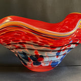 Large Fluted Red Bowl with Blue Chips, Black Threading and Yellow Lip Wrap.